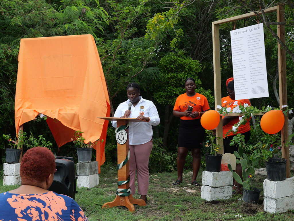 Nadidja Parker reads the names of murdered victims